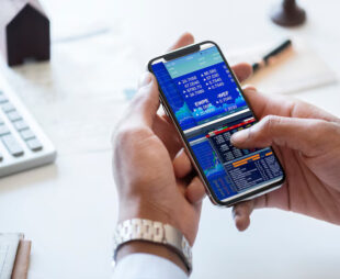 businessman checking stock market online 53876 14787