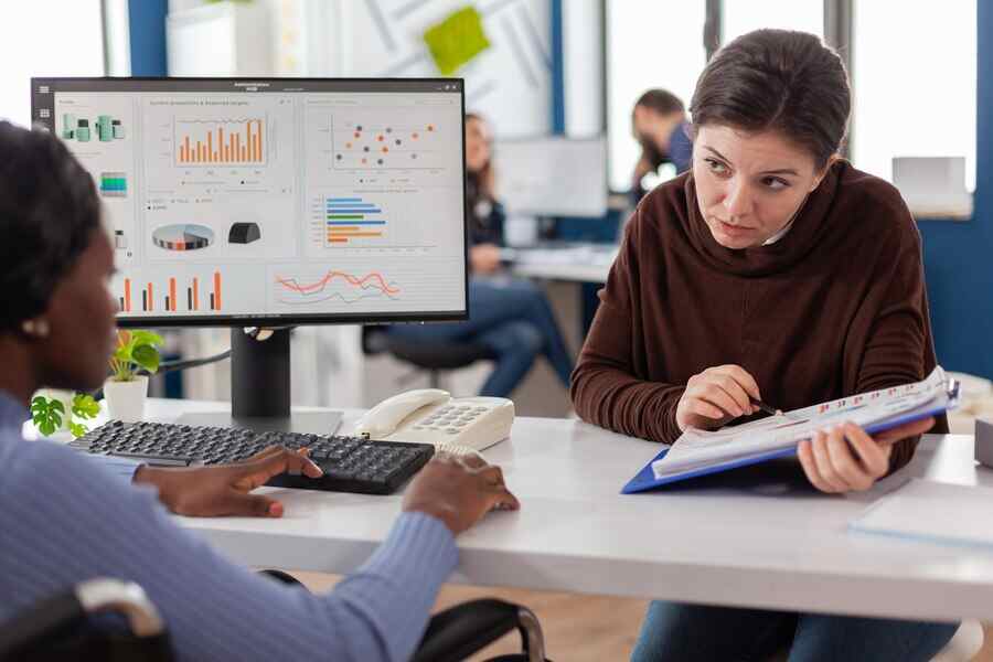 Pros and Cons of Finishing Homework in One Sitting 1 businesswomen planning financial strategy looking computer working together start up company officet 482257 2082 2