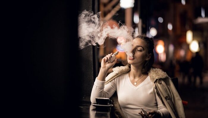 Woman Vaping in Public 700px