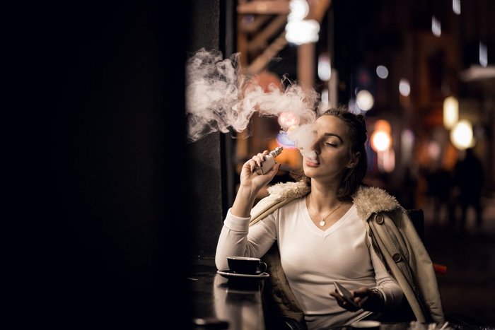 Are 2 Gram Vape Cartridges Safe? 1 Woman Vaping in Public