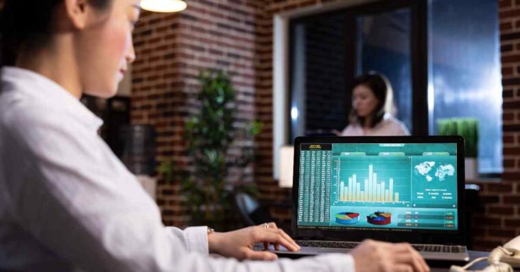 employee examining company performance 1