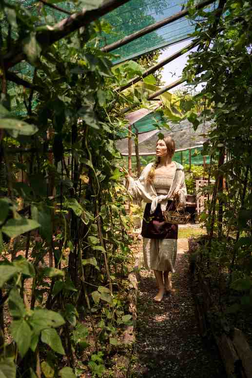 full shot woman walking with basket 1