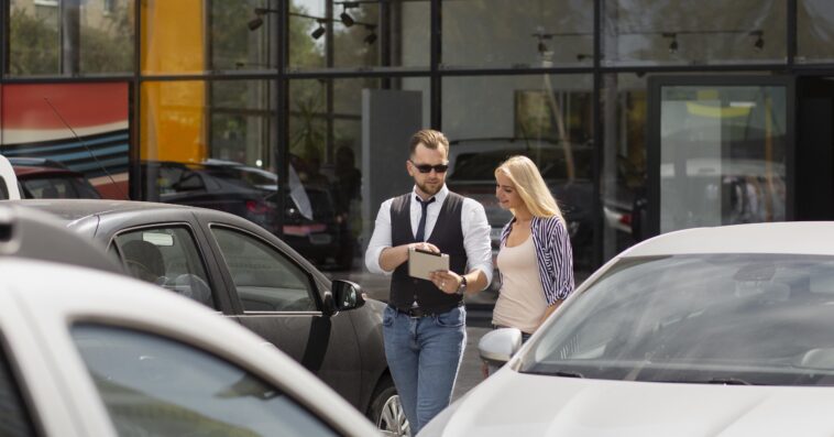 happy customer car dealership with seller 1