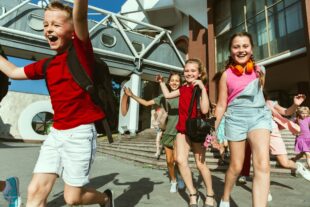 happy kids playing city s street sunny summer s day front modern building group happy childrens teenagers having fun together concept friendship childhood summer holidays 2048x