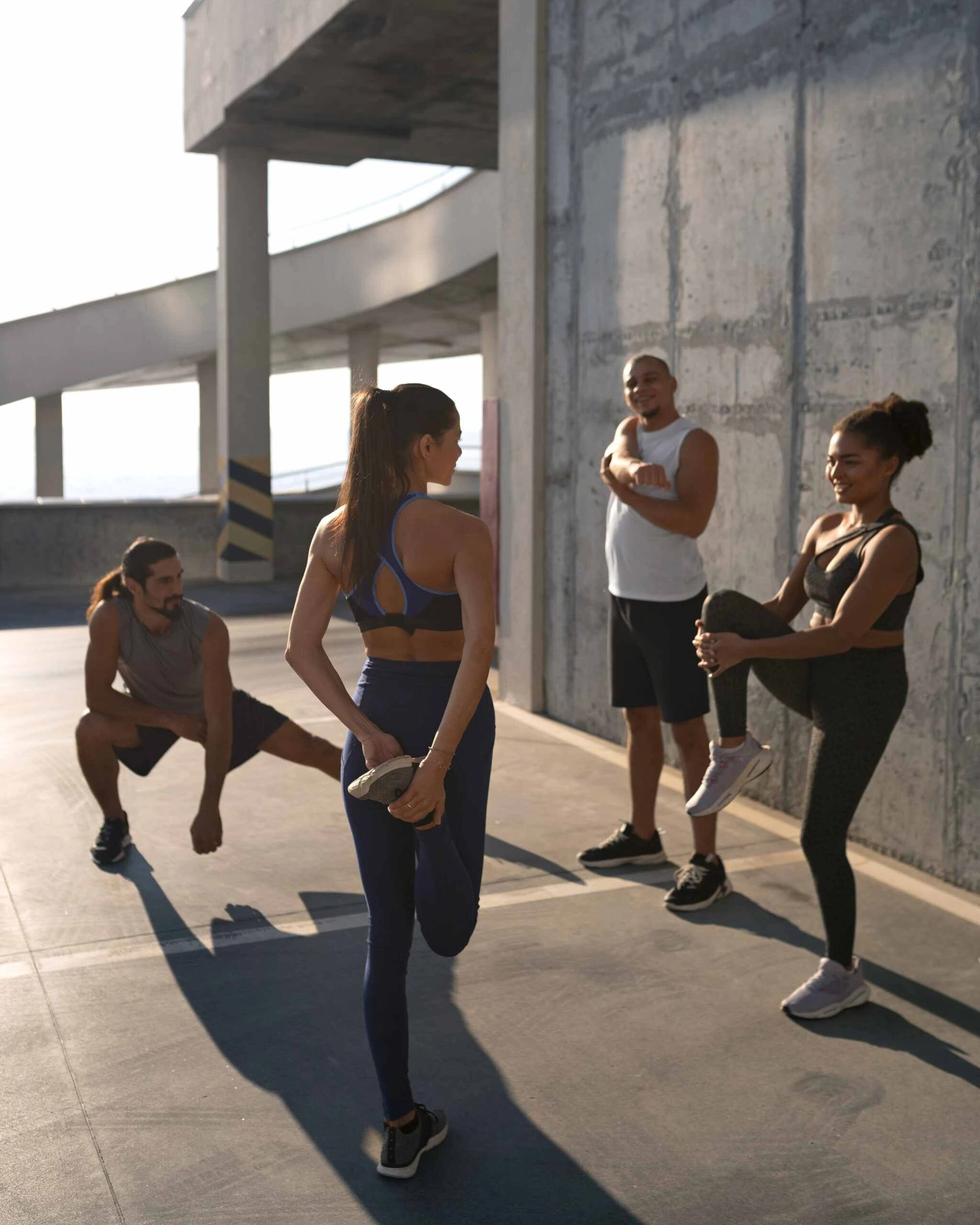 imageye group people exercising together outdoors