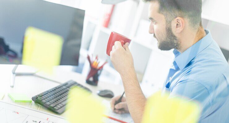 young man stands office near transparent board with stickers 88135 4334