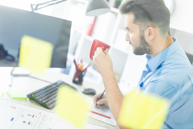 young man stands office near transparent board with stickers 88135 4334