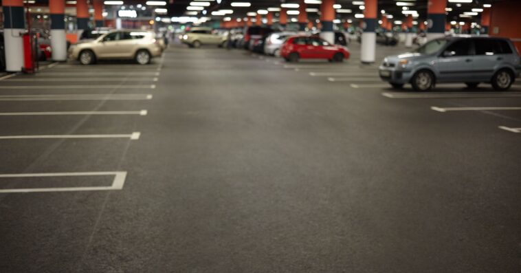 horizontal picture car parking underground garage interior with neon lights autocars parked buildings urban constructions space transportation vehicle night city concept 3