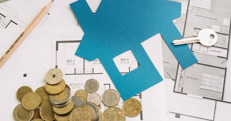 key with house figurine coins 1 1