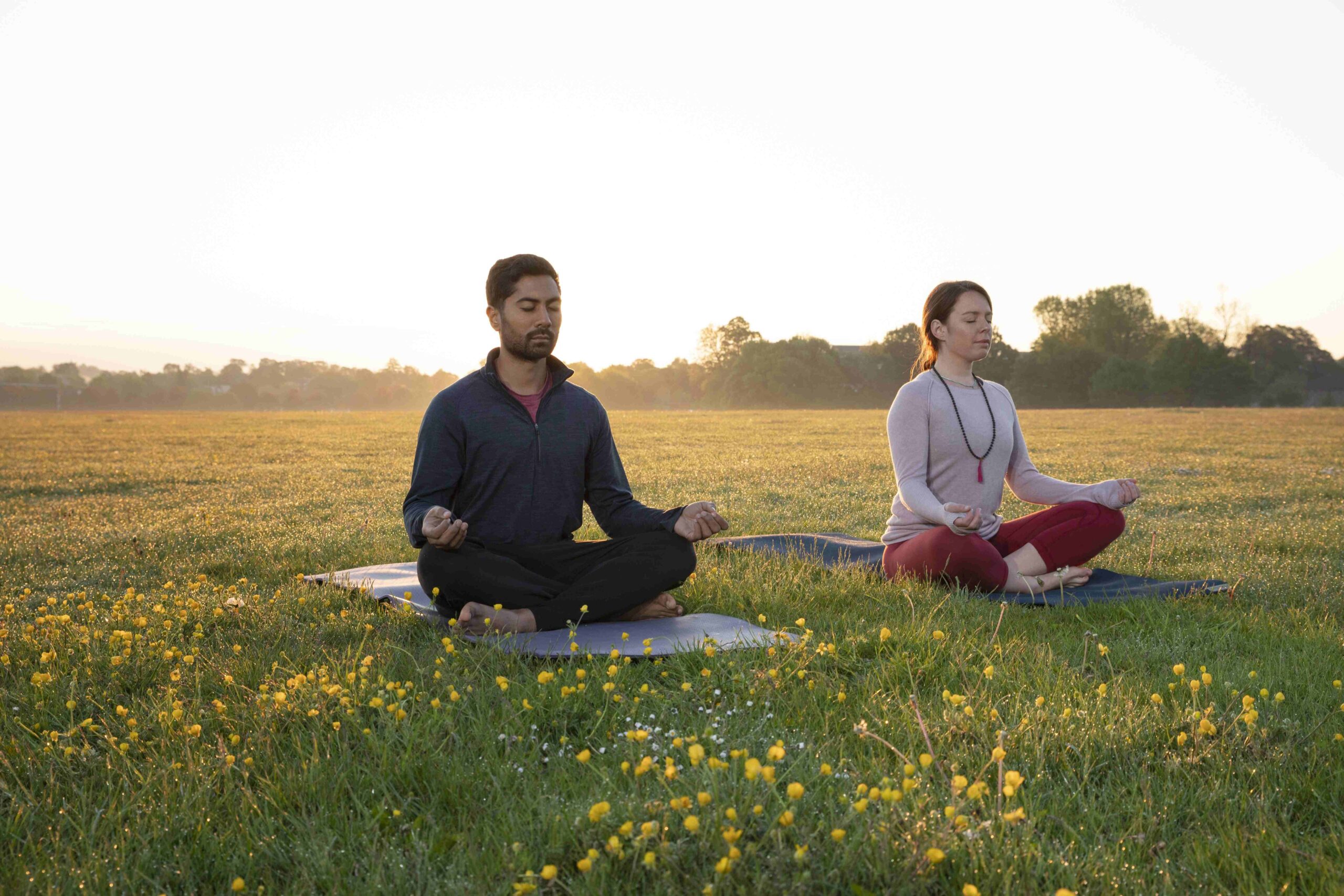 Willka Pacha Experience – Authentic Healing Retreats in Peru 1 man woman doing yoga together outdoors 1 1 scaled
