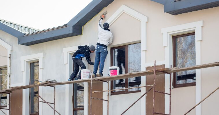 masters are working finishing modern apartment house 1