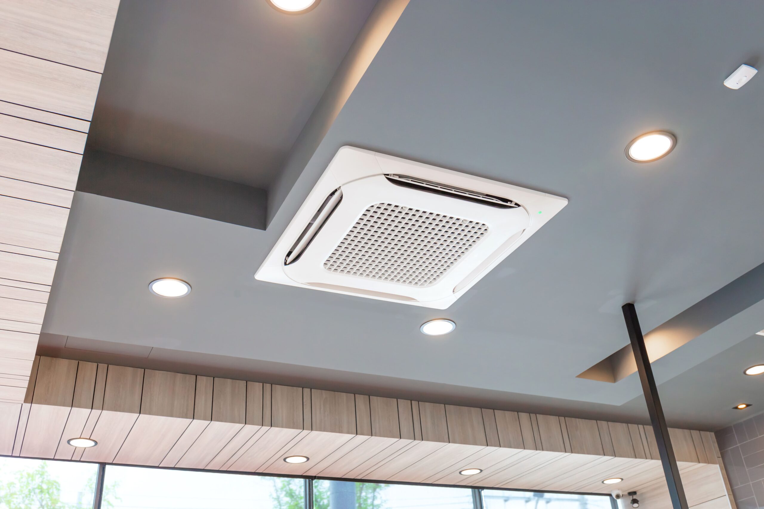Reliable Ducted Aircon Brisbane Services 1 modern ceiling mounted cassette type air conditioning system coffee shop 1 scaled