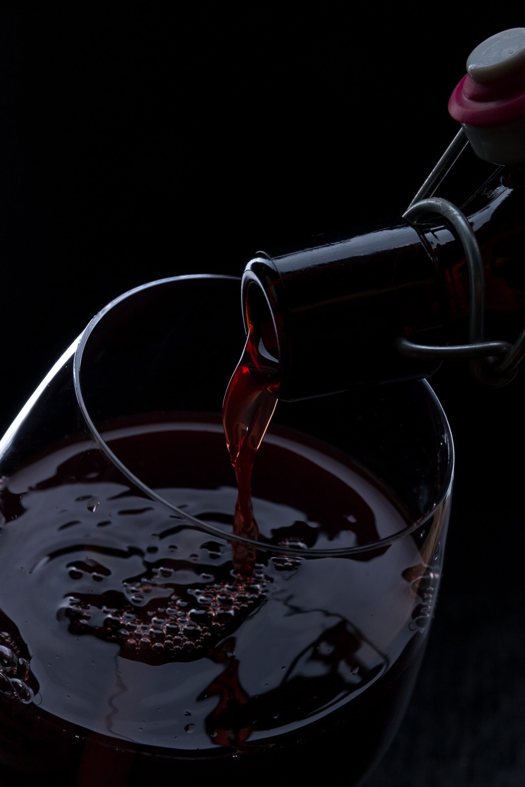 Experience the Unique Flavor of Zeka Vineyards' Finest Pinot Noir Red Wine 1 red wine pouring 1 scaled