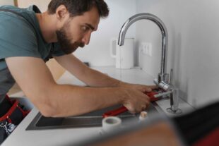 side view man working as plumber 1 3
