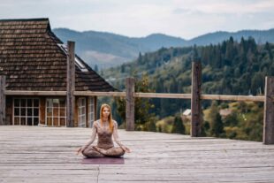 woman sitting lotus position morning fresh air 2 1 1