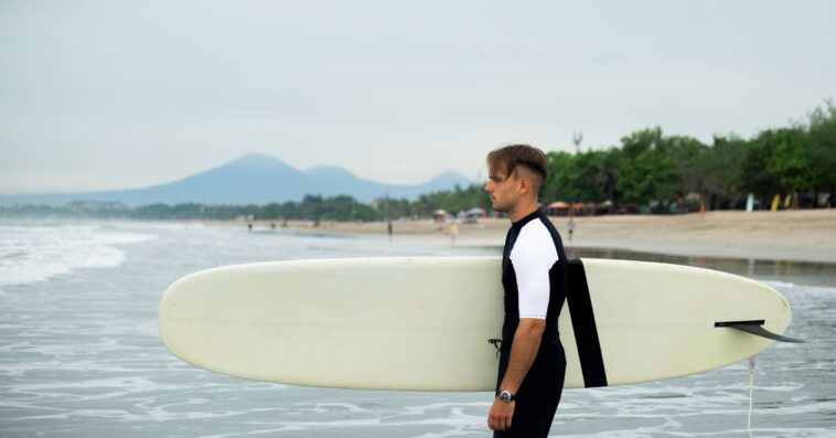 young man goes surfing 1