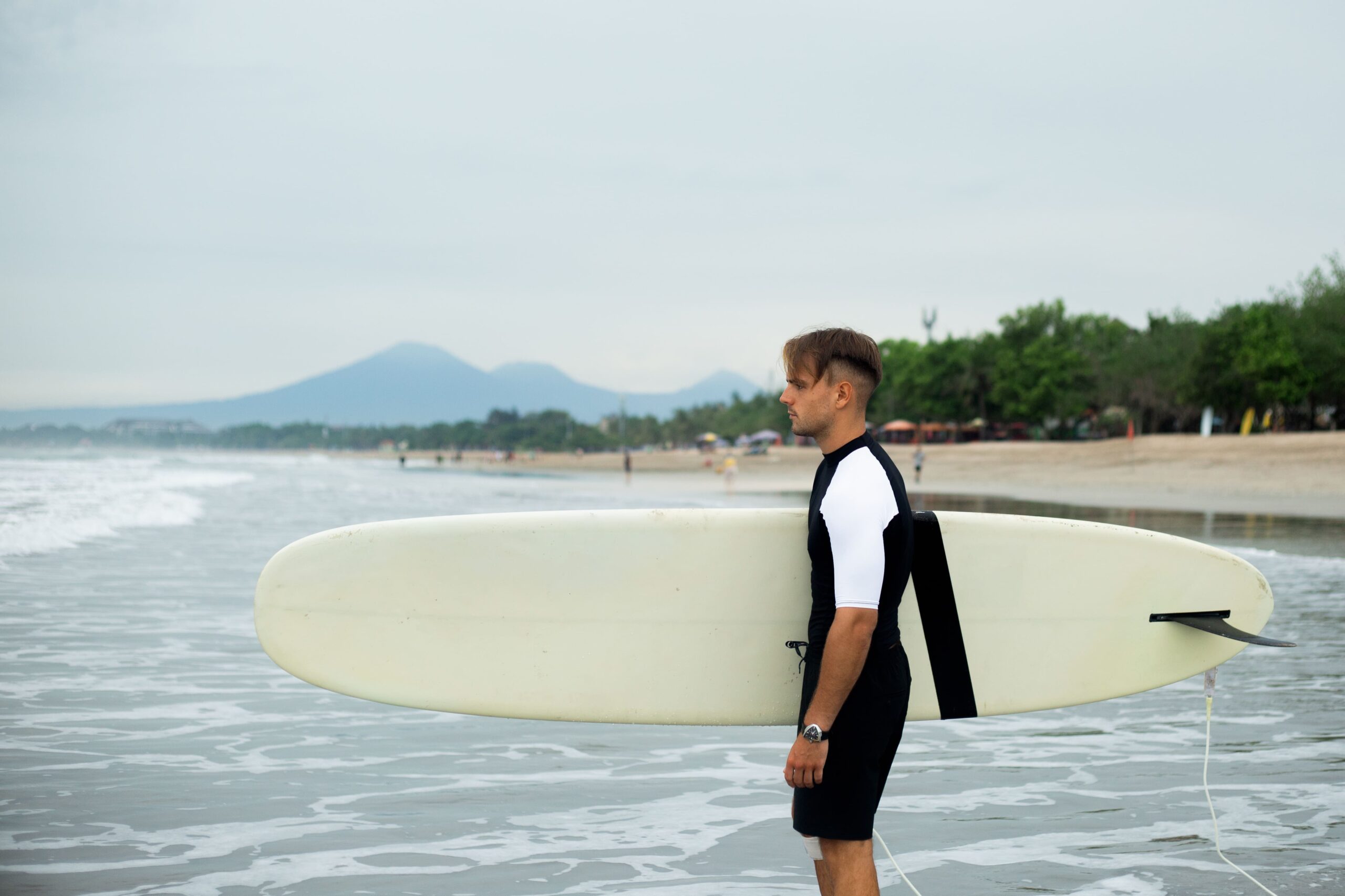 Lombok Surfing – Ride the Best Waves in Indonesia 1 young man goes surfing 1 scaled
