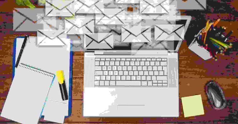 workdesk with envelopes laptop 1 1