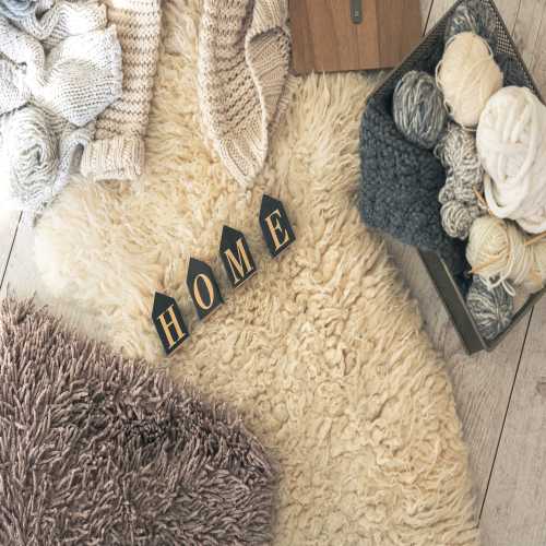 cozy home composition with threads knitting top view 1