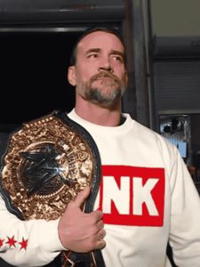 CM Punk WWE 2025 RAW World Heavyweight Champion Cream Crewneck Sweatshirt with White and Red Logo Detailing